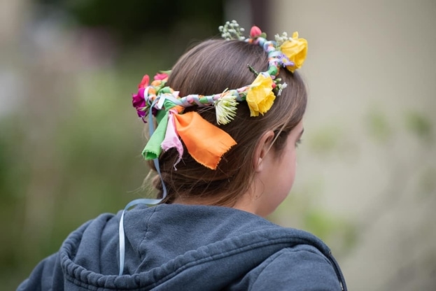 Girl wearing flower crown.